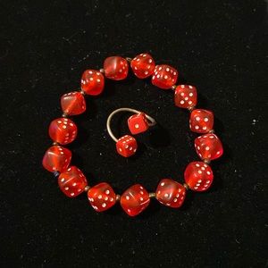 Red dice belly ring and bracelet never worn